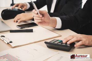 Close-up Of Two Businessman Analyzing Graph On Digital Tablet